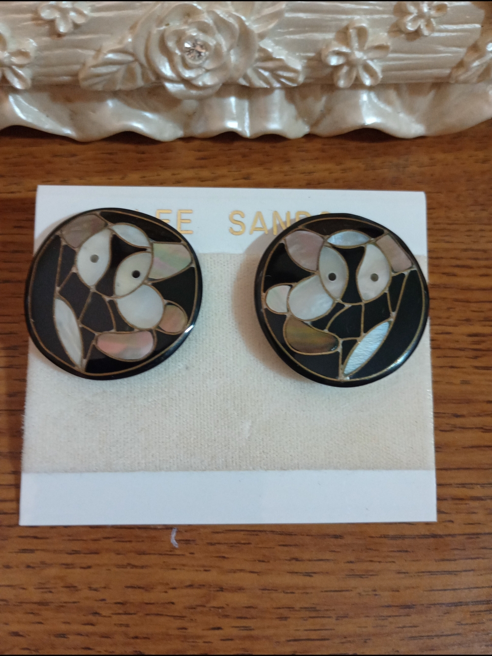 Round Black Inlay Floral Clip-On Earrings Lee Sands. Kola Bears, New